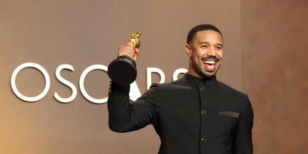 Michael B. Jordan holds up his Oscar in the press room during on March 15, 2026.