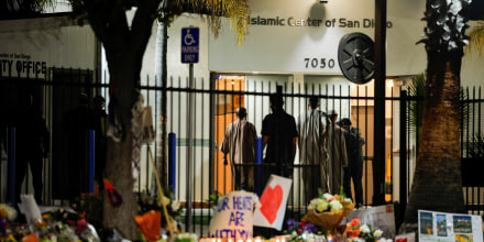 People take part in an early morning call to prayer at the Islamic Center of San Diego