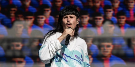 Oliver Tree performing onstage. 