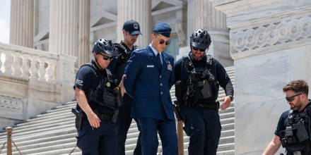 U.S. Air Force Major Jason Watson is arrested by police on the Capitol steps.