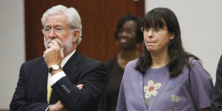 Andrea Yates (R) stands with her attorne