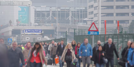 Image: Passengers are evacuated from the terminal building