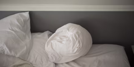 Image: An unmade bed
