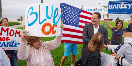 Democrat Harley Rouda greets supporters at a rally in Laguna Beach, California, on Nov. 6, 2018.