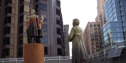 Image: \"Women's Column of Strength,\" a bronze statue by artist Steven Whyte, at St. Mary's Square in San Francisco, California, on Nov. 1, 2017.