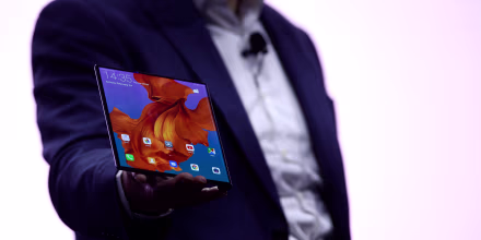 Image: Richard Yu, the CEO of Huawei's consumer products division, holds the Mate X foldable smartphone at the Mobile World Congress in Barcelona on Feb. 24, 2019.