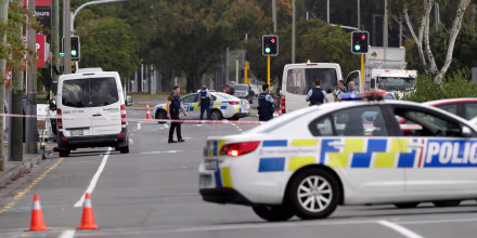Image: Police stand outside a mosque in Linwood, Christchurch, New Zealand, Friday, March 15, 2019. Multiple people were killed during shootings at two mosques full of people attending Friday prayers