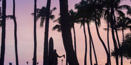 Storm chasing surfers and body boarders enjoy the waves kicked up by Hurricane Lane