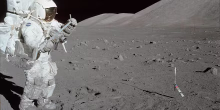 NASA astronaut Harrison Schmitt collects lunar rake samples during the Apollo 17 misssion at the Taurus-Littrow landing site on Dec. 11, 1972.