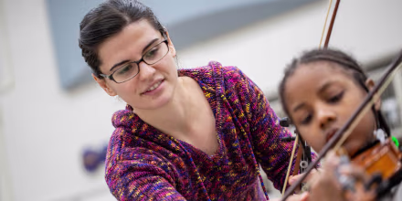 A teacher and student in the Detroit public schools.