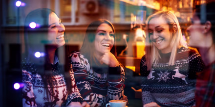 Girls laughing in cafe