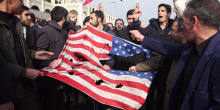 Image: Iranians tear up a U.S. flag during a demonstration in Tehran on Jan. 3, 2020 following the killing of Iranian Revolutionary Guards Major General Qassem Soleimani in a U.S. strike on his convoy at Baghdad international airport.