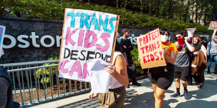 Demonstrators rally at the Boston Children's Hospital to support trans children and gender affirmation treatments.