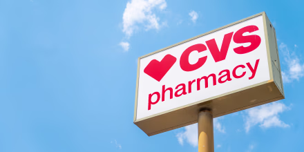 The CVS pharmacy logo is seen outside of a storefront 