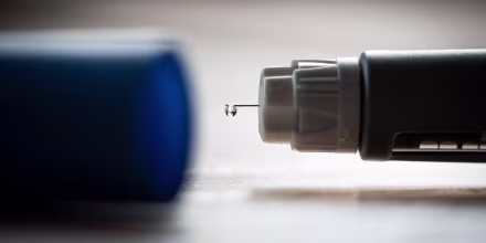 An Ozempic (semaglutide) injection pen is seen on a kitchen table