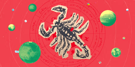 Paper cutout of the scorpio zodiac on a red background