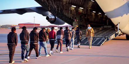 An image shared by Press Secretary Karoline Leavitt on January 24 of a deportation flight.