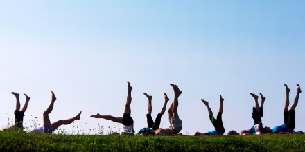 Yoga students point their toes skyward during a weekly session at Kettle Cove. The donation-based classes are held on Fridays at 8 a.m. The donations are split between Kettle Cove State Park and South Portland-based nonprofit group Cultivating Balance, teacher Melora Gregory said.