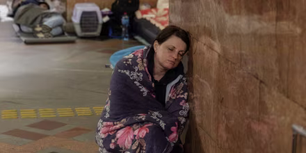 People take shelter at a metro station during Russian air attacks on Kyiv, Ukraine early on Thursday. 