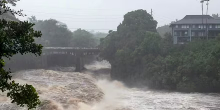 The rising water levels at the Wainaku Street Bridge