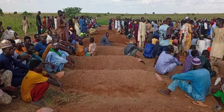People attend a funeral in the countryside in Nigeria.