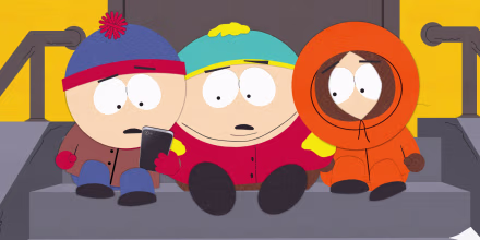 South Park characters, from left, Stan Marsh, Eric Cartman, Kenny McCormick, sitting on a set of stairs in front of a door looking at a phone together