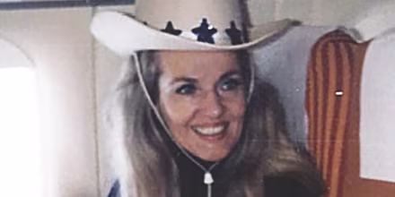 Image: Dee Brock in her younger years, wearing a cowboy hat and smiling.