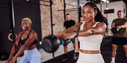 friends doing kettlebell workout