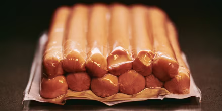 Packaged Sausages in Vacuum-Sealed Plastic for Freshness and Longevity