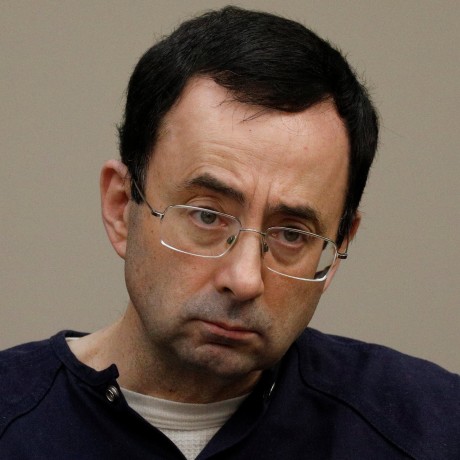 Image: Larry Nassar, a former team USA Gymnastics doctor who pleaded guilty in November 2017 to sexual assault charges, sits in the courtroom during his sentencing hearing in Lansing, Michigan