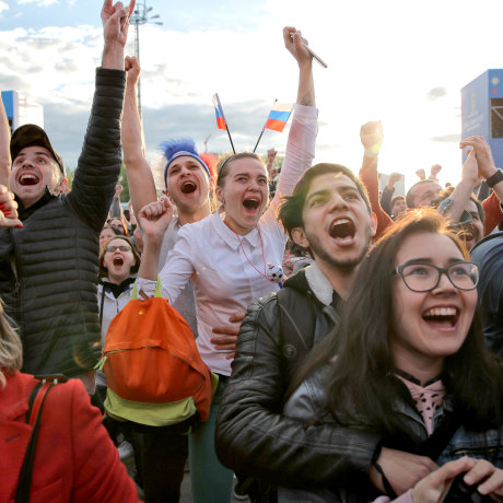 Image: Fans celebrate after Russia scored the first goal during the opening match of the World Cup