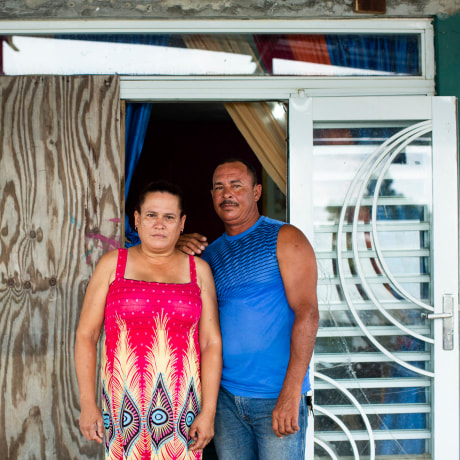 Image: Ram?n Paez-Marte and Sol D. Reyes Perez in their home