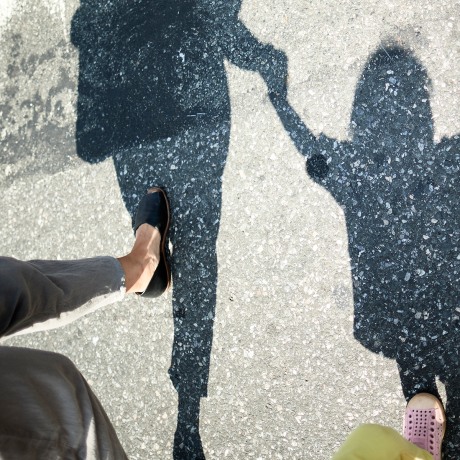 Mother, Father And Son Holding Hands.