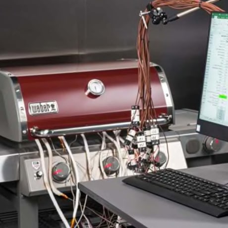 A Weber grill is tested in a CR lab.
