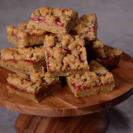 Cobbler meets cookie in these sweet, jammy bars.