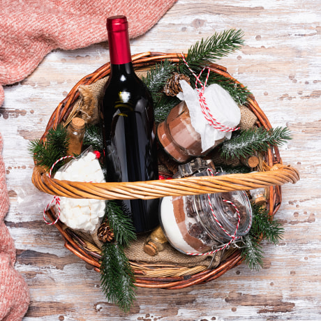 Christmas gift basket with Bottle of red wine and cookie mix