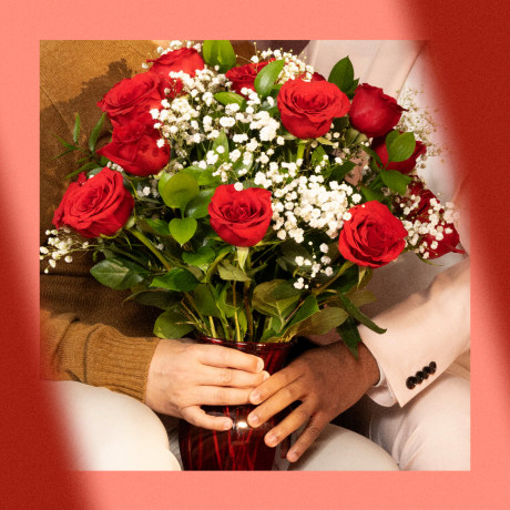 Image of people holding roses