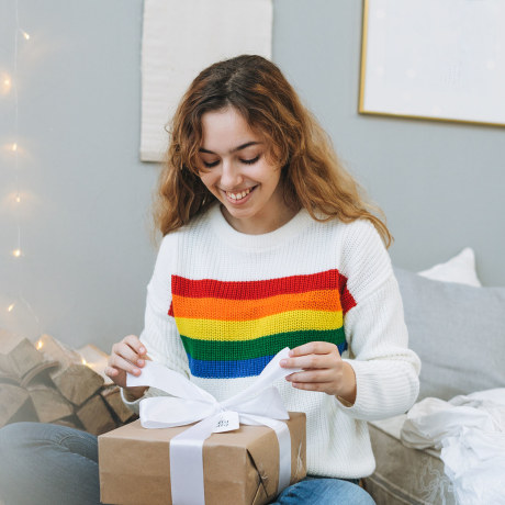 Beautiful Happy Teenager Girl With Gift Box On Bed In Cozy Children Room