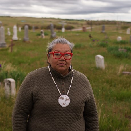Marsha Small at the Red Cloud Indian School's historic cemetery in May.