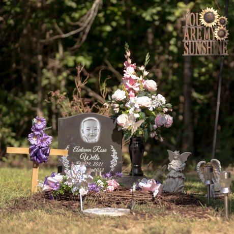 Autumn Wells' mother Taylor Wells at her daughter’s final resting place at the family cemetery plot in Belmont, Miss., on July 30, 2023.