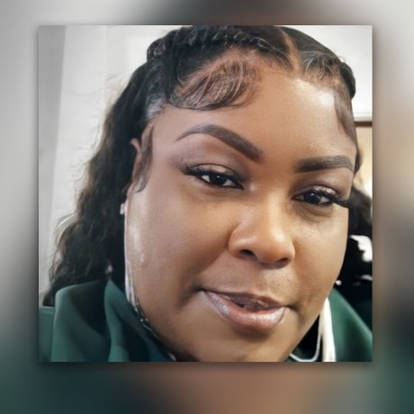 Valerie Elder Smiley standing in front of her car, which is also missing.