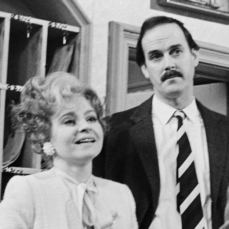 Prunella Scales and John Cleese in a scene "Fawlty Towers."