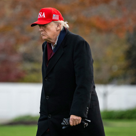 President Donald Trump walks on the South Lawn of the White House after arriving on Marine One on Nov. 22, 2025.