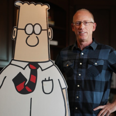 Scott Adams, cartoonist and author and creator of "Dilbert", poses for a portrait with a life-sized Dilbert cutout in his home office on Monday, January 6, 2014 in Pleasanton, Calif. 