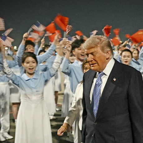 President Donald Trump arrives in Beijing 
