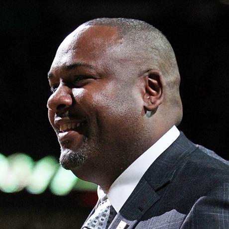 Stacey King smiles