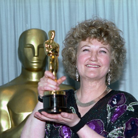 Brenda Fricker holds up her Oscar after winning Best Supporting Actress for her role in My Left Foot on March 26, 1990 in Los Angeles, CA. 