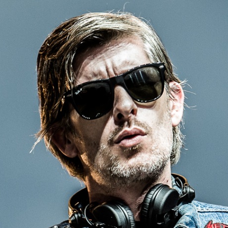 Kavinsky dances at a DJ Booth