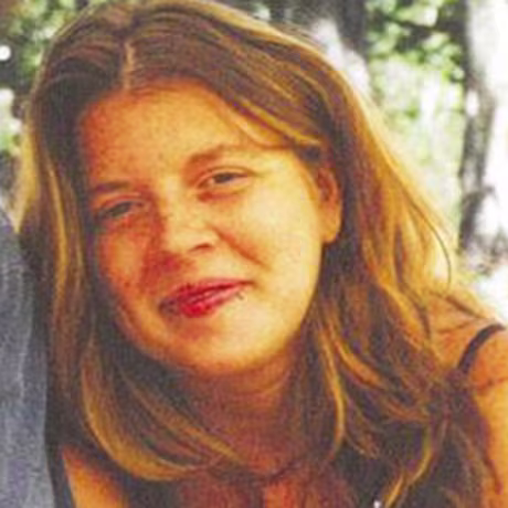 Stephanie Anne Warner is described as 5'2\" tall, weighing 115 lbs., with strawberry blonde hair.