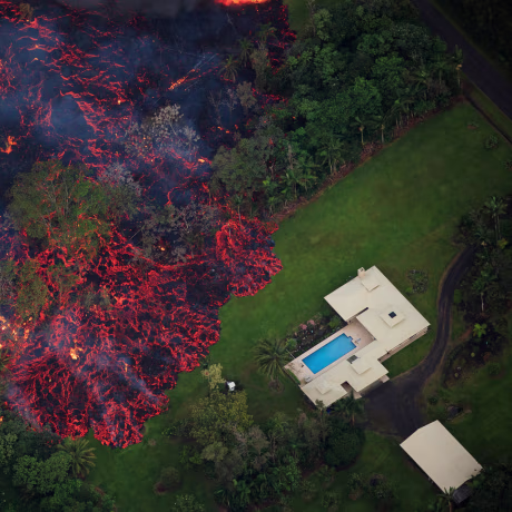 Image: Lava flows into the Leilani Estates subdivision after a fissure eruption